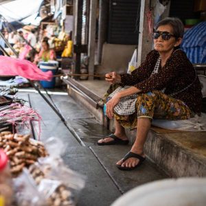 Moments Before Impact - Vendors Prepare for Train at Maeklong