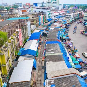 Thrill Seekers' Paradise - Train Passing Through Maeklong Market