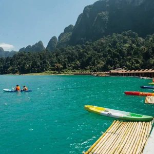 Float into paradise on our Khao Sok Lake Tour from Phuket - where your private raft house becomes your serene sanctuary on the emerald waters