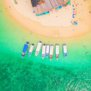 Views don't get better than this! Eating Thai food with our toes in the sand during our Phi Phi Island day trip itinerary